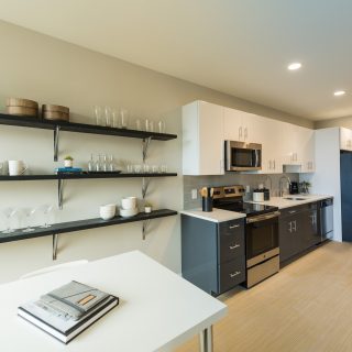 Open-concept kitchen and dining room space in The National's Old City apartments