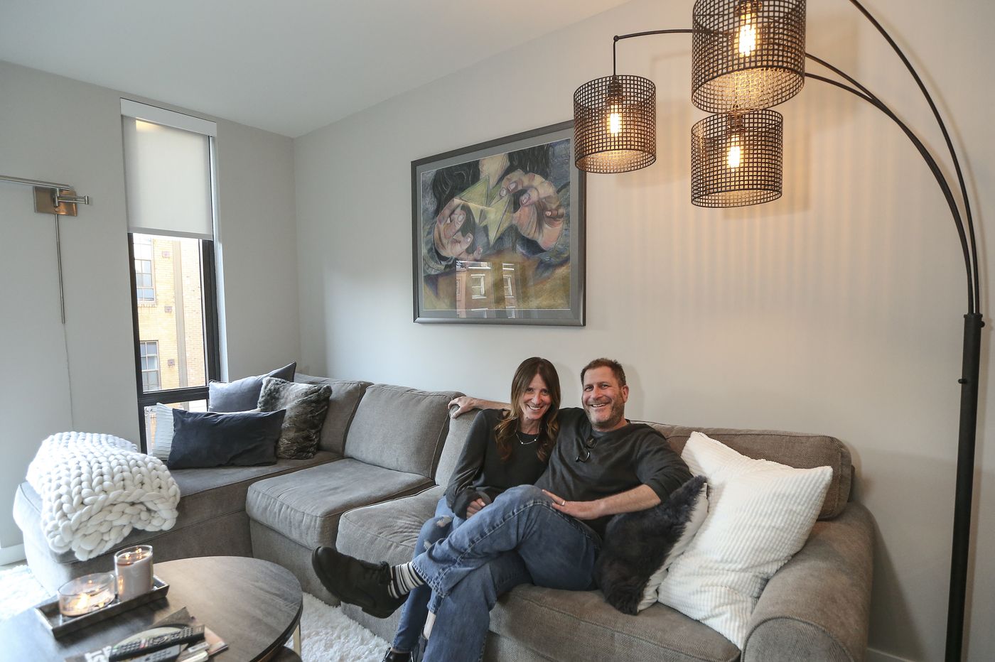 Couple inside apartment home at The National in Old City